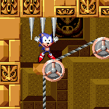 When you get to the first chain of platforms, do not stay on the ones moving upwards, as they will crush you into these spikes.