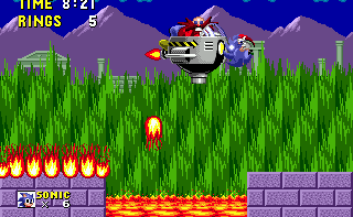 A pretty easy boss this one. Just alternate between the two platforms according to the one Eggman isn't hovering above, dropping his fireballs, and hit him as he then makes his way towards you.