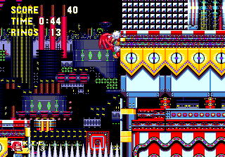 Things are a bit different for Knuckles. There's no water, first of all, and some minor object placement tweaks mean there's no way of getting on Sonic's route from here. Instead, climb the right hand wall and destroy the block at the top to find the start of your incredibly quick route for the act.