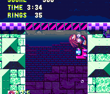 Keep on going and you eventually dash straight up a wall and get momentarily trapped between a switch and its gate. Jump to break it, but then grab the wall to prevent falling. From there, you briefly join Sonic's route, up to the surface.