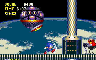 The Act 2 boss is controlled by remote - clearly Eggman isn't taking chances this time. It's a large purple spherical bot that floats inside an arena, flanked either side by gravity reversal tubes. You cannot attack it directly, as a bumper constantly protects it from you.