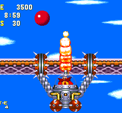Against Knuckles, this boss is more generous with the flame thrower, firing it at regular intervals and during each swing. More interesting to note is the fact that for this boss only, it's not Eggrobo that Knuckles is fighting but the Eggman himself!