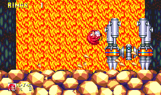 This large driller badnik, straight from Marble Garden can be caught burrowing into the rock at two separate points. The first is early on in Knuckles' act. Jumping at him proves useless..