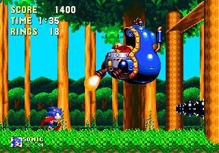 With the satellite destroyed, Eggman pops out of the ground in its place and then darts off, retreating to the right. Chase him over the hill, and then you must jump over a series of spikeballs linked across pillars, as Eggman floats through them.