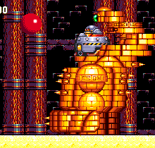 Hit the head of the machine to blast away the whole upper shell, revealing Eggman/Eggrobo sitting in its cockpit underneath. There's a surprise. You have a second or two to hit him before the shell returns.