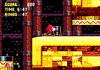 Knuckles takes his own route through a barricade, and finds himself at a similar puzzle to Sonic's, though it's actually in a different room, and it's a bit more complicated. This switch will open the door over to the right, which of course Knuckles can reach, but unfortunately it closes far too quickly!