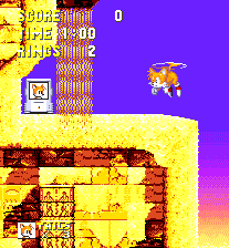 At the top of this area above, fly all the way to the top left corner of the tall room, ignoring the catapult below for the moment, and a valuable 1-up is yours for the taking.