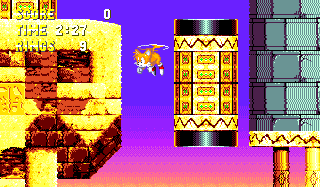 This one can only be accessed with Tails. If you take the highest route, above the sand pits in Point #4, then after the tall turquoise pillar, fly toward the highest path to the right, you can find this room.