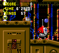 Your time as mini Sonic ends when you find another laser, which will return you to normal. Dodge the giant bomb to get there.