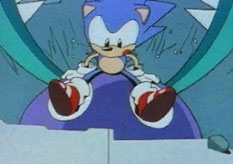 Sonic runs through a nondescript old, collapsing factory floor that lands him on top of a large badnik.