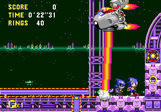 At the starting line, you'll find Metal Sonic all tuned up for the race of his life. Eggman lurks above too and is about to fire a laser down just to the left of him, so make sure you're standing to the right of Metal Sonic.